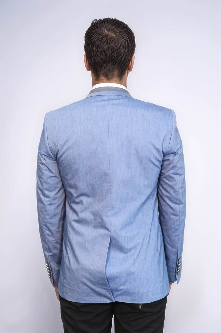 Chaqueta azul claro con 3 bolsillos y 2 botones con ribete cruzado - Wessi