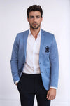 Chaqueta azul de algodón con escudo y 2 botones y 3 bolsillos