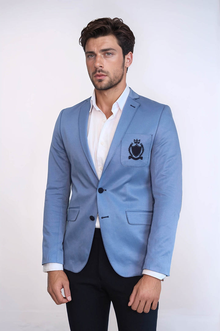 Chaqueta azul de algodón con escudo y 2 botones y 3 bolsillos