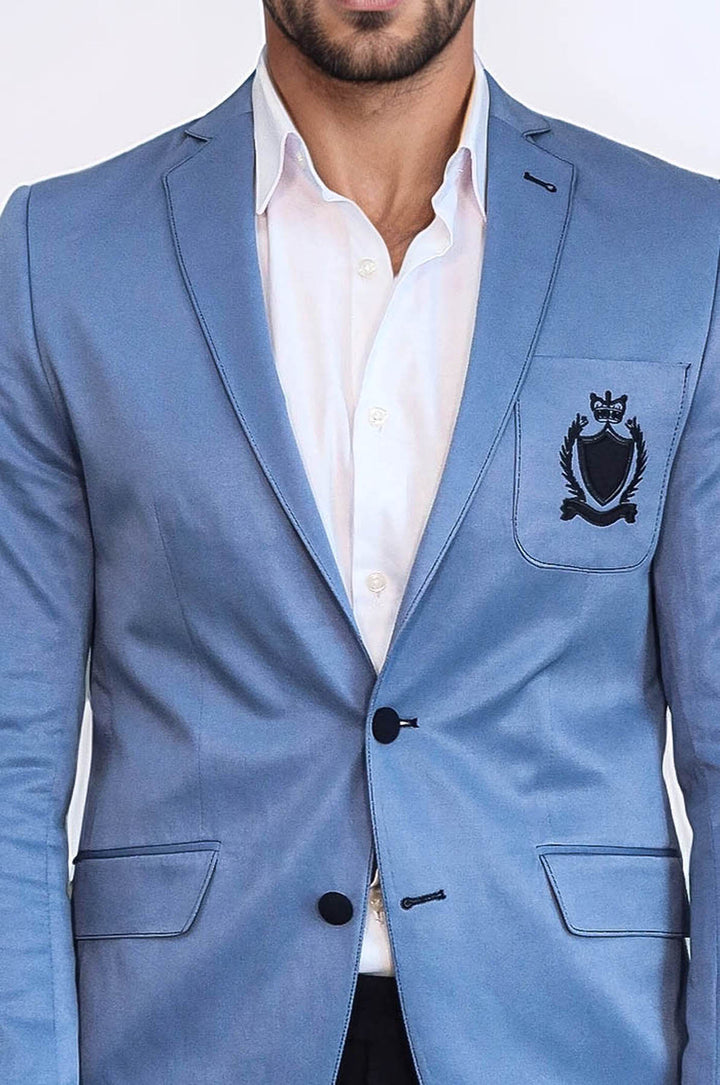 Chaqueta azul de algodón con escudo y 2 botones y 3 bolsillos