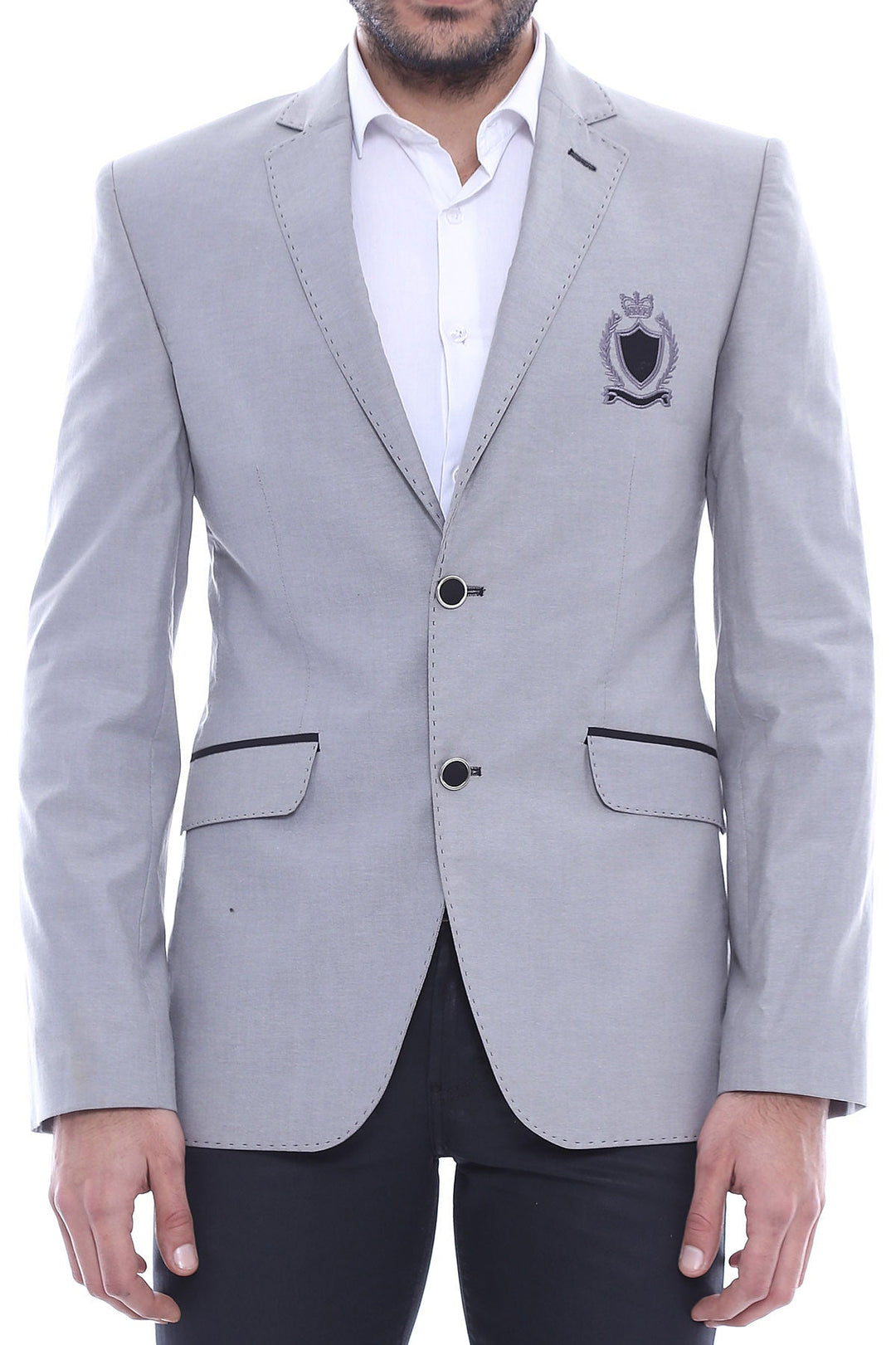 Chaqueta gris con solapa monocromática y dos botones con escudo - Wessi