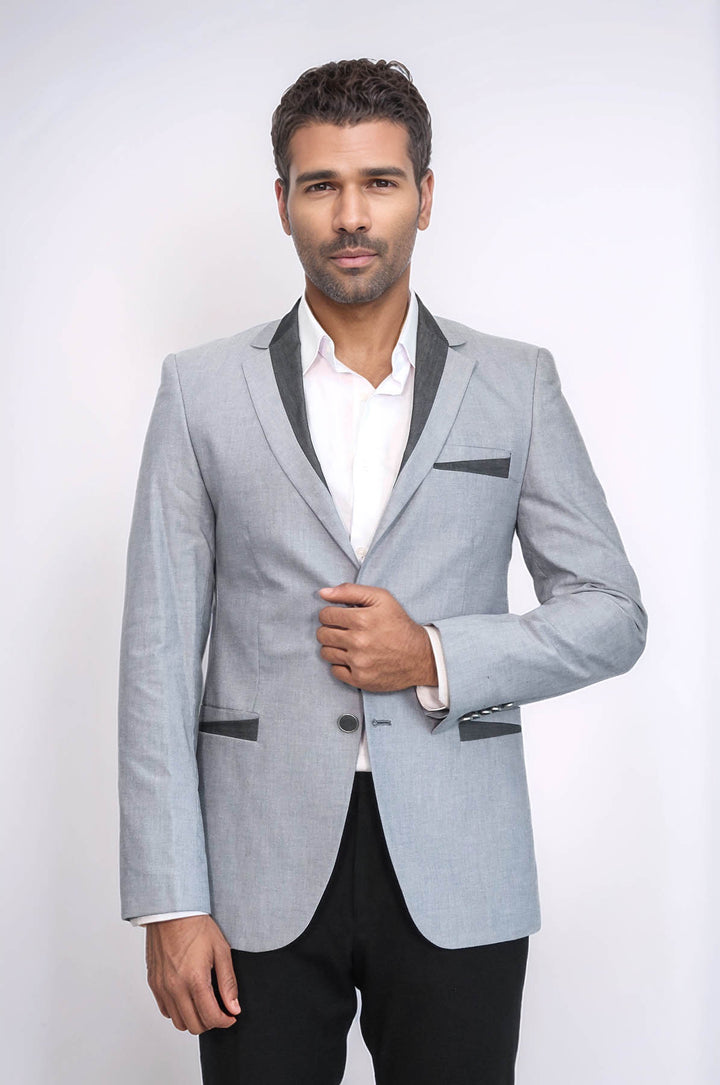 Chaqueta gris con 3 bolsillos y 2 botones con ribete cruzado - Wessi