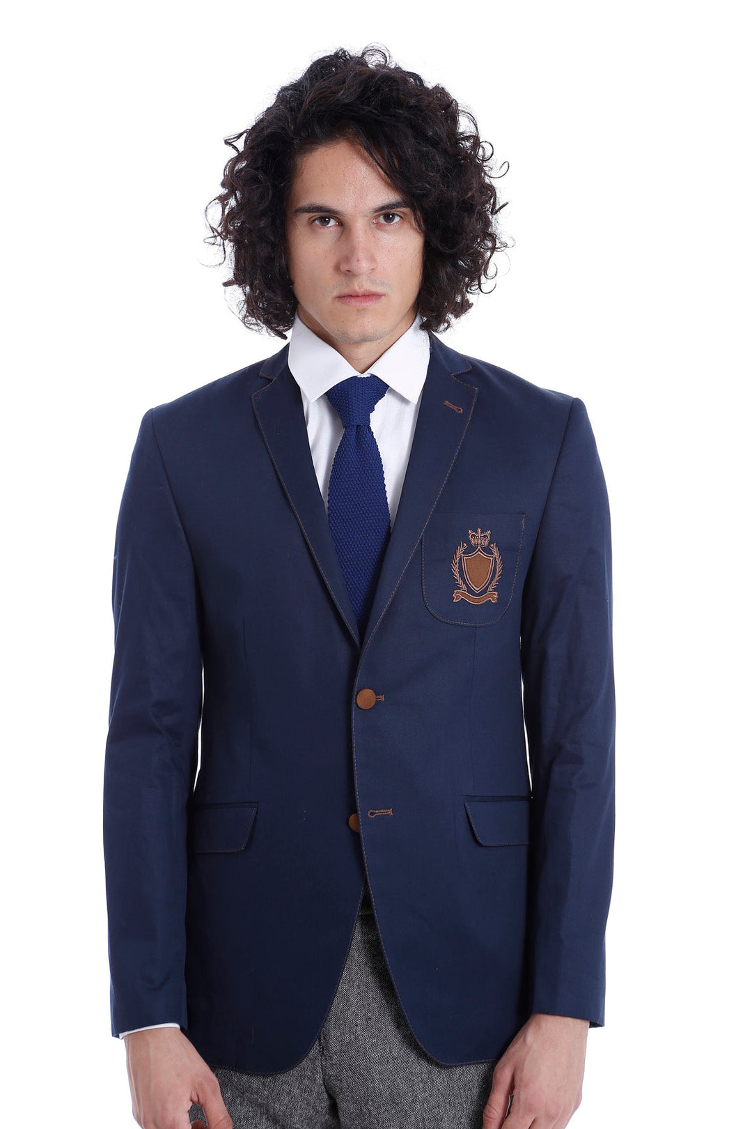 Chaqueta azul de algodón con escudo y 2 botones y 3 bolsillos